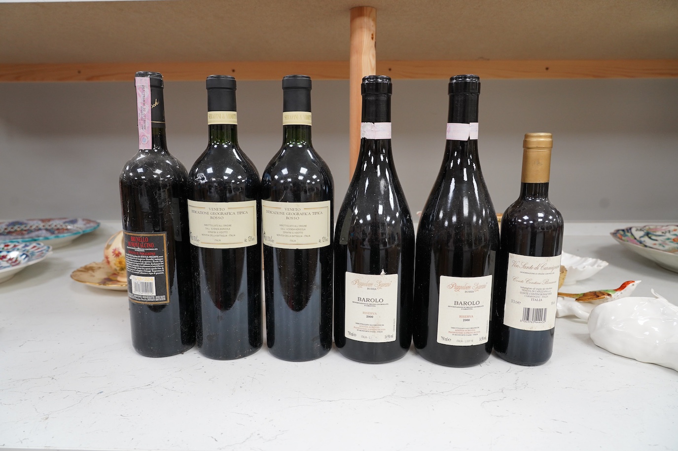 Six Italian bottles of wine to include two bottles of Il Rosso Dell’ Abazia 1999, two bottles of Pianpolvere Soprano Barolo Riserva 2000, a bottle of Brunello Di Montalcino Il Poggione 2004 and a 375ml bottle of Vin Sant